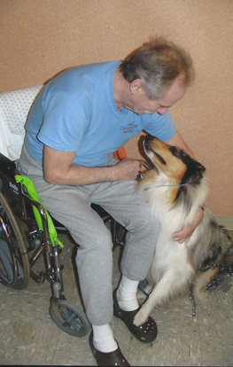B with wheelchair man